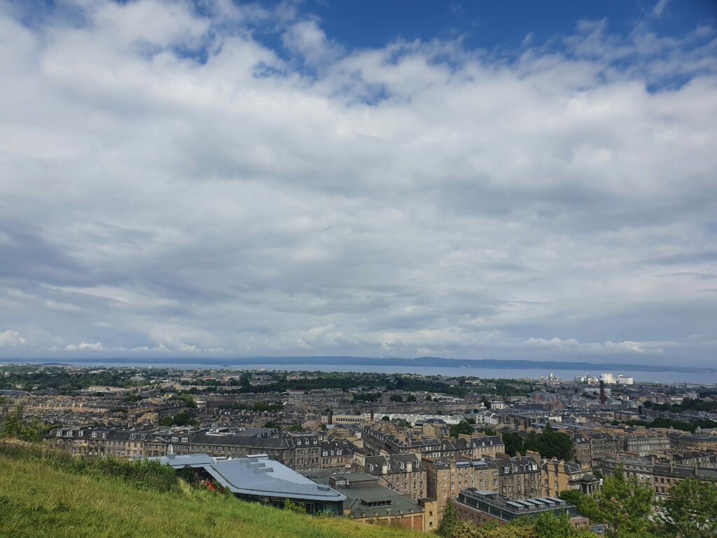 View over Edinburgh from Calton Hill. In the background Firth of Forth.